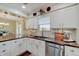 This kitchen features white cabinets, stainless steel appliances and butcher block countertops at 120 Crosby Dr, Indianapolis, IN 46227