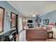 Cozy living room features hardwood floors, wood burning stove, and neutral decor at 120 Crosby Dr, Indianapolis, IN 46227