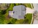 Bird's-eye view of the roof and backyard deck area surrounded by lush trees at 12011 Glen Cove Dr, Indianapolis, IN 46236
