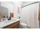 Cozy bathroom featuring a shower with a white curtain and a vanity with decorations at 1230 Amberley Way, Westfield, IN 46074