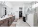 Spacious bathroom with double vanity, walk-in shower, and modern fixtures at 1230 Amberley Way, Westfield, IN 46074