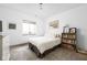 Relaxing bedroom with a bed and a bookshelf near the window at 1230 Amberley Way, Westfield, IN 46074