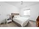 Inviting bedroom featuring a bed, end table, and window at 1230 Amberley Way, Westfield, IN 46074