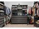 Walk-in closet featuring custom shelving, drawers, and ample storage space at 1230 Amberley Way, Westfield, IN 46074