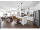 Spacious kitchen featuring a large island, stainless steel appliances, and hardwood floors at 1230 Amberley Way, Westfield, IN 46074