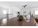 Spacious open-concept living area with hardwood floors, ample natural light, and modern decor at 1230 Amberley Way, Westfield, IN 46074
