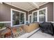 Cozy outdoor patio area with stylish furniture and view of the backyard at 1230 Amberley Way, Westfield, IN 46074