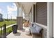 Inviting porch with comfortable seating and decorative accents, perfect for relaxing outdoors at 1230 Amberley Way, Westfield, IN 46074