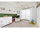 Well-lit bedroom with fun décor, a glider chair, and a spacious closet at 1239 Northcraft Ct, Franklin, IN 46131