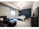 Comfortable bedroom featuring cozy decor, carpet floors, and a modern chandelier at 12725 Parsons Gate, Carmel, IN 46032