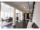 Spacious dining room showcasing hardwood floors, elegant decor, and natural light at 12725 Parsons Gate, Carmel, IN 46032