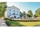 West Clay building with classic architecture, clock tower, fountain, and well-manicured landscaping at 12725 Parsons Gate, Carmel, IN 46032