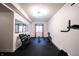 Home gym featuring weight rack, mirror and updated lighting at 12725 Parsons Gate, Carmel, IN 46032