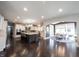 Open concept layout features a seamless flow from the gourmet kitchen to the bright dining area at 12725 Parsons Gate, Carmel, IN 46032