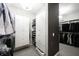 Spacious walk-in closet with custom shelving, cabinets and drawers for optimal storage and organization at 12725 Parsons Gate, Carmel, IN 46032