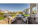 Backyard deck with comfortable seating and stainless steel grill offers suburban views at 16016 Viking Lair Rd, Westfield, IN 46074
