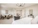 Spacious bedroom featuring an open layout with sitting area and decorative accents at 16016 Viking Lair Rd, Westfield, IN 46074
