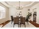 Formal dining room featuring modern chandelier, and stylish decor at 16016 Viking Lair Rd, Westfield, IN 46074