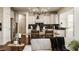 Stylish kitchen with stainless steel appliances and a dining area at 16016 Viking Lair Rd, Westfield, IN 46074