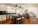 Modern kitchen with an island and stainless steel appliances at 16016 Viking Lair Rd, Westfield, IN 46074