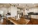 Bright kitchen with an island, stainless steel appliances, and ample dining space at 16016 Viking Lair Rd, Westfield, IN 46074