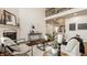 Bright and open living room with fireplace and staircase at 16016 Viking Lair Rd, Westfield, IN 46074