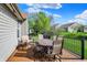 Back deck featuring comfortable seating and a grill, perfect for entertaining guests at 1649 Woodfield Dr, Greenwood, IN 46143