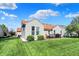 Expansive backyard with a well-maintained lawn and an inviting deck area at 1649 Woodfield Dr, Greenwood, IN 46143