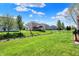 Expansive backyard featuring lush green grass, a charming gazebo, and a serene outdoor space for relaxation at 1649 Woodfield Dr, Greenwood, IN 46143