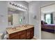 Bathroom featuring double vanity and a walk-in shower at 1649 Woodfield Dr, Greenwood, IN 46143