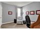 Inviting bedroom with neutral walls, an accent chair, and bright natural light at 1649 Woodfield Dr, Greenwood, IN 46143