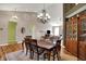 Bright dining area with wood floors and open to living area, great for entertaining guests at 1649 Woodfield Dr, Greenwood, IN 46143