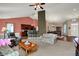 Comfortable living room with a cozy seating area and view into the open concept kitchen at 1649 Woodfield Dr, Greenwood, IN 46143