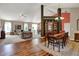 Open-concept living room, dining area, hardwood and carpeted floors, perfect for entertaining at 1649 Woodfield Dr, Greenwood, IN 46143