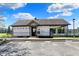 Community pool house with ample parking and convenient facilities for residents' enjoyment at 1649 Woodfield Dr, Greenwood, IN 46143