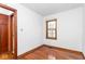 Bright bedroom with hardwood floors and neutral walls at 1726 N Euclid Ave, Indianapolis, IN 46218