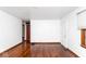 Open living area showcasing hardwood floors and neutral wall color at 1726 N Euclid Ave, Indianapolis, IN 46218