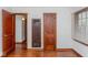 Image of hardwood floors and neutral walls in the home's living room at 1726 N Euclid Ave, Indianapolis, IN 46218