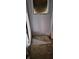 Damaged staircase with damaged walls at 1924 E Maryland St, Indianapolis, IN 46201