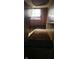 Old wooden staircase with a window at the top at 1924 E Maryland St, Indianapolis, IN 46201