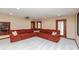 Finished basement featuring plush carpeting, a large sectional, and recessed lighting at 1937 Knightsbridge Rd, Danville, IN 46122