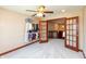 Bedroom featuring neutral carpet, open closet and French doors to adjacent space at 1937 Knightsbridge Rd, Danville, IN 46122