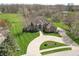 Striking home with a manicured lawn, inviting entryway, and lush landscaping at 1937 Knightsbridge Rd, Danville, IN 46122