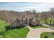 Beautiful home with a well-manicured lawn, inviting entryway, and lush landscaping at 1937 Knightsbridge Rd, Danville, IN 46122