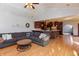 Open floor plan showcasing a living room connected to a kitchen, with hardwood floors and neutral decor at 1937 Knightsbridge Rd, Danville, IN 46122