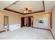 Spacious main bedroom with tray ceilings, ceiling fan and fireplace at 1937 Knightsbridge Rd, Danville, IN 46122