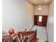 Staircase leading to a cozy sitting area with built-ins at 1937 Knightsbridge Rd, Danville, IN 46122