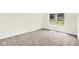 Carpeted bedroom with neutral walls and large window for natural light at 19602 Atwater Ave, Sheridan, IN 46069