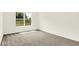 Well-lit bedroom with a large window offering a view of the outdoors at 19602 Atwater Ave, Sheridan, IN 46069