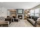 Beautiful living room with cozy fireplace and plenty of natural light at 19602 Atwater Ave, Sheridan, IN 46069